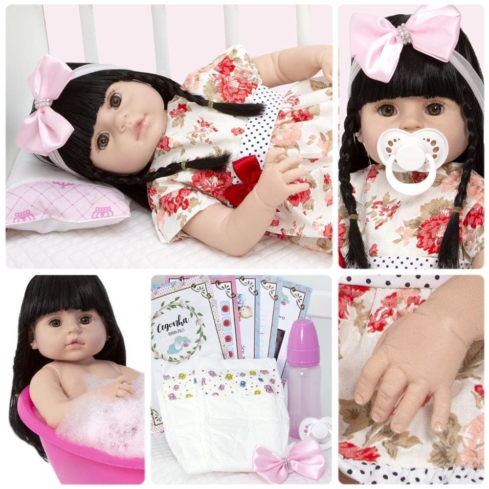 Boneca bebe reborn morena com cilios roupa rosa 16 itens