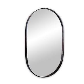 Espelho decorativo oval suspenso com moldura preta 80x50cm