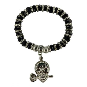Pulseira pomba gira rosa caveira preta cristal e silicone