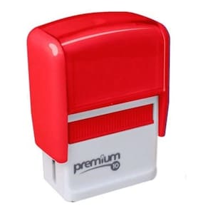 Carimbo pronto com palavra pago com tinta vermelho