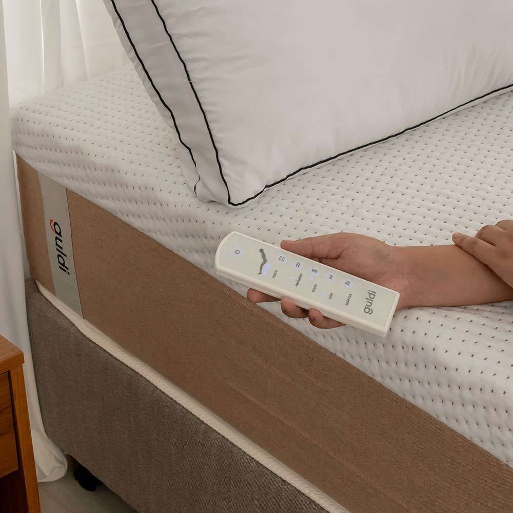 colchão casal guldi comfort com massageador quântico molas ensacadas (30x138x188) branco e bege