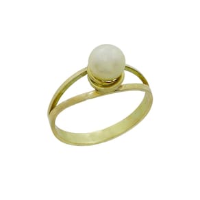 Anel de pérola natural água salgada dois aros de ouro 18k