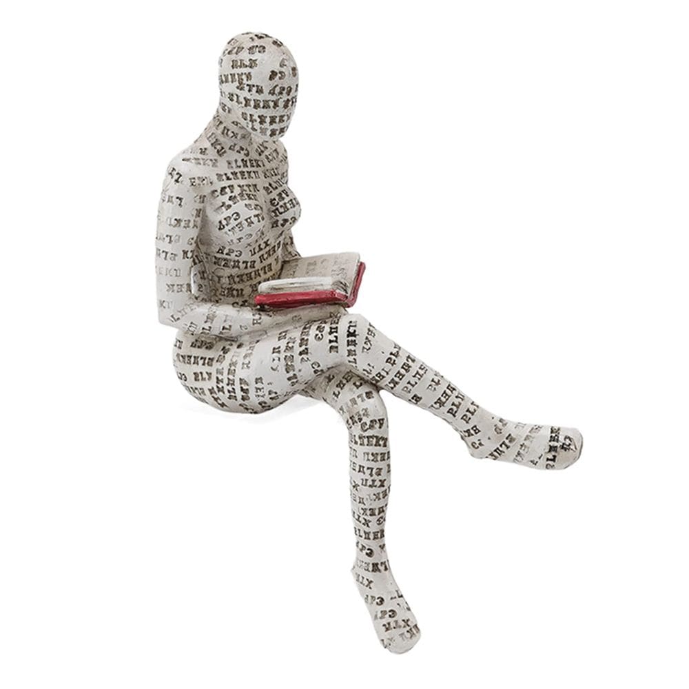 Estatueta Focket lendo escultura feminina e ornamentos de celulose em resina