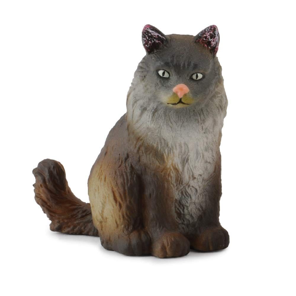 Coleção de brinquedos: um gato norueguês da floresta sentado