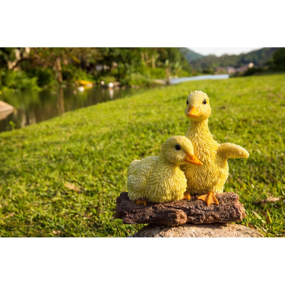 Estátua de jardim de resina de patinhos brincalhões da Hi-Line Gift Ltd.