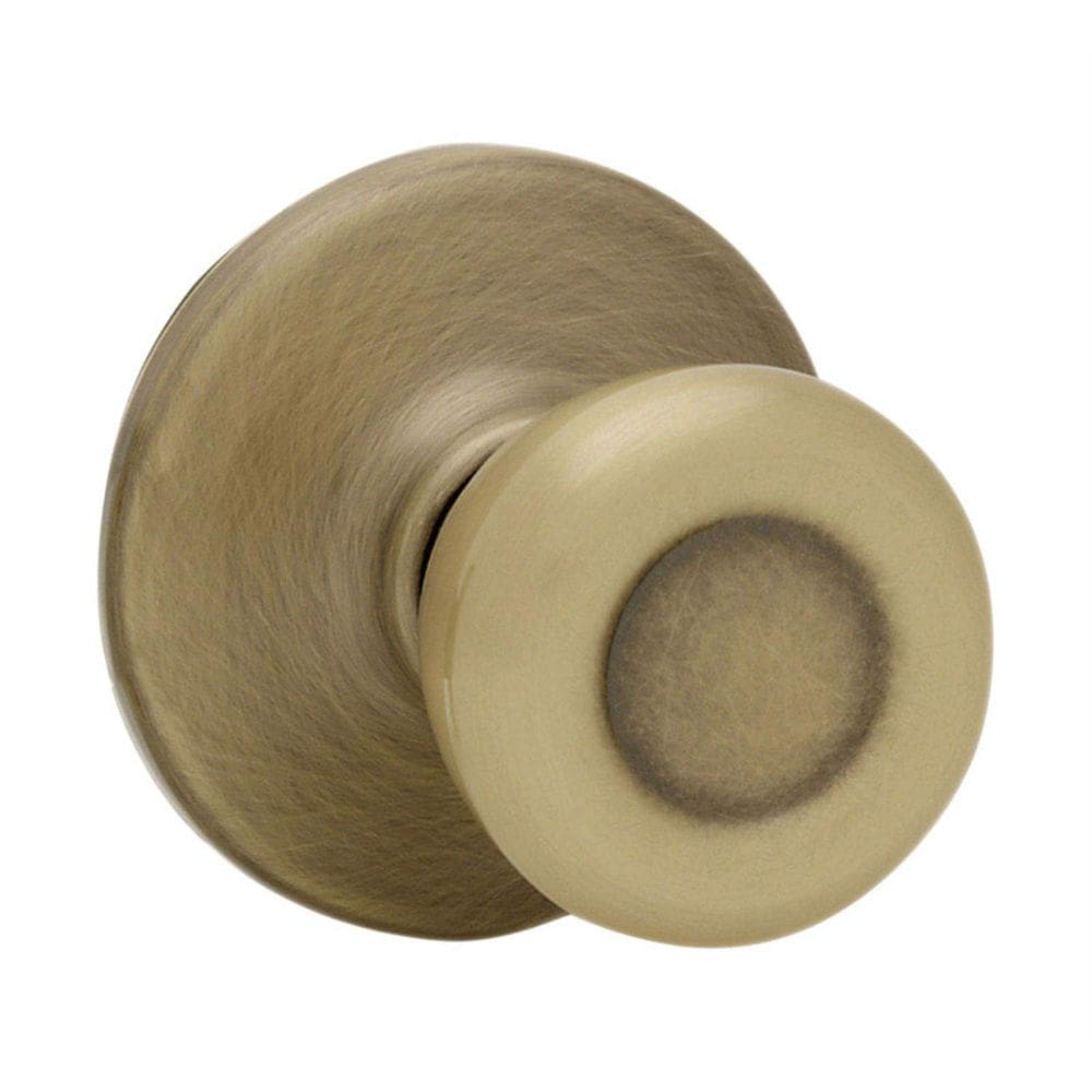 Maçaneta de porta Kwikset Tylo Interior Passage em latão antigo