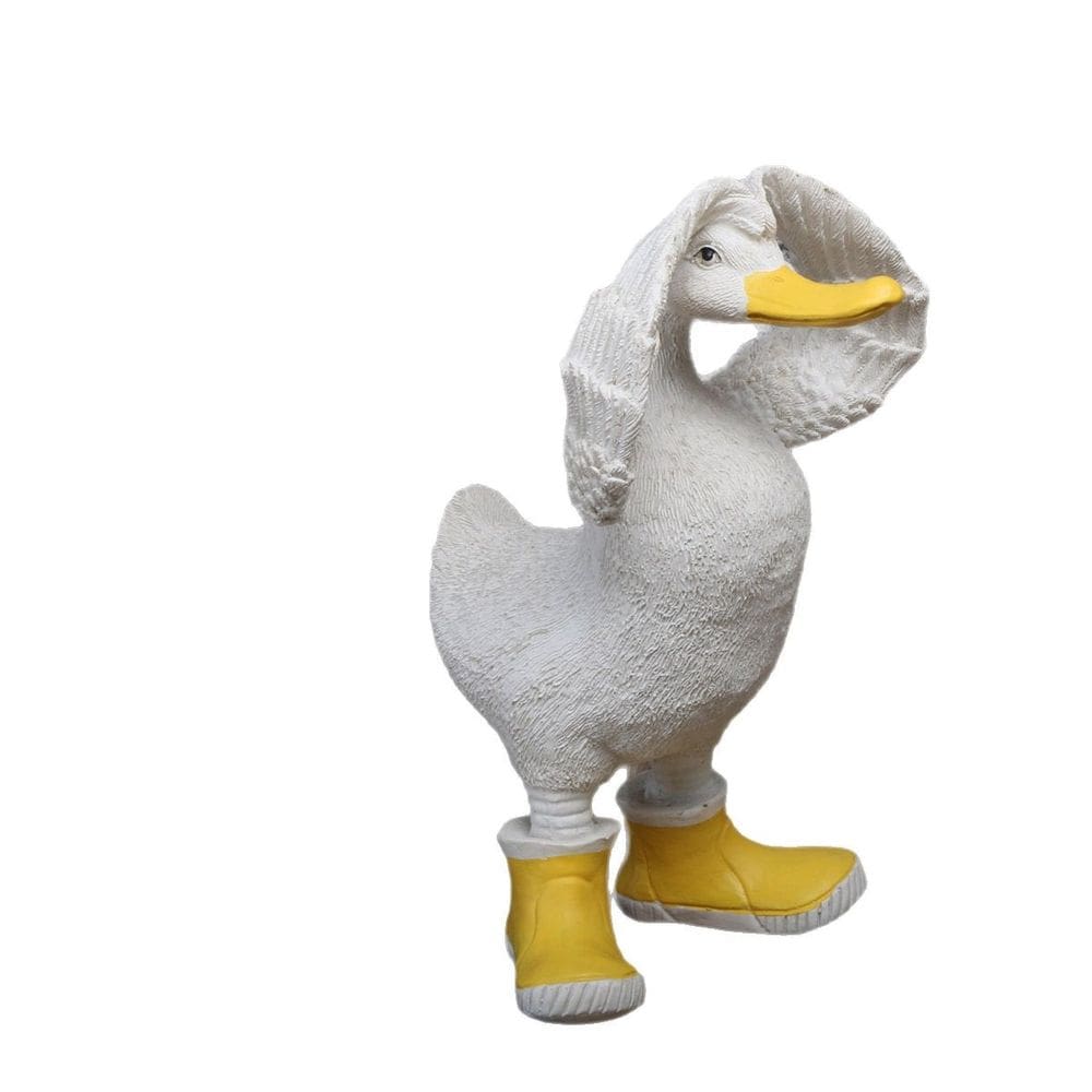 Escultura: estátua de pato engraçado com botas, resina 11x21cm