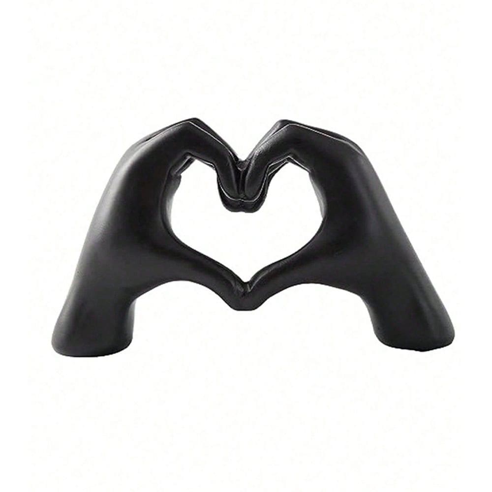 Escultura: resina, coração, mãos, gesto moderno de mão preta