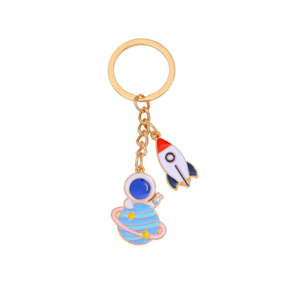 Chaveiro Cartoon Astronaut com Rocket & Planet Zinc Alloy