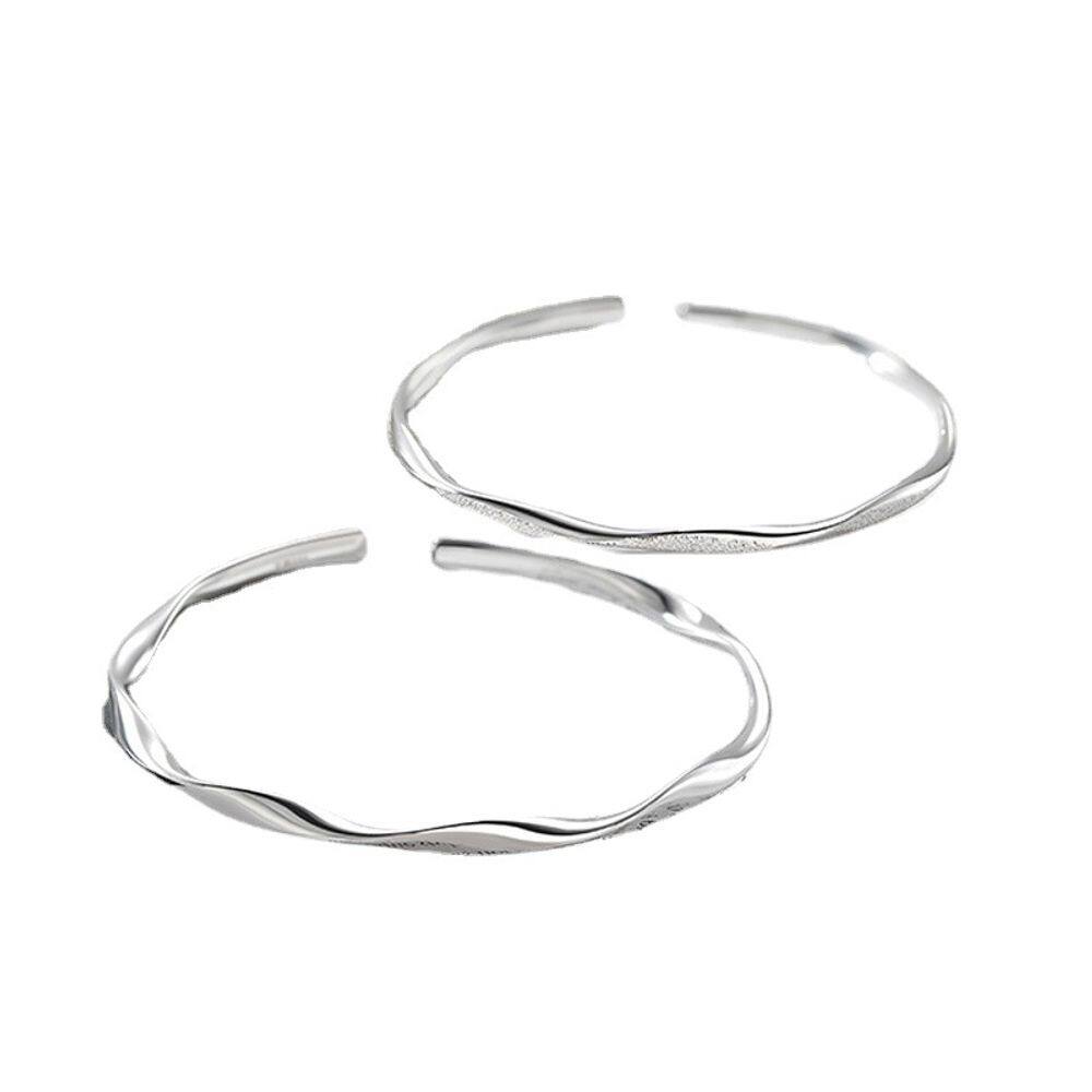 Conjunto de pulseiras de cuproníquel inspirado em Mobius para casal