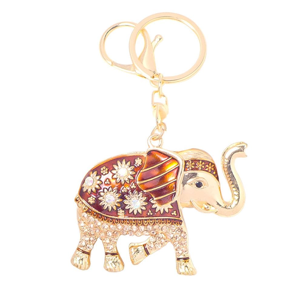 Chaveiro de elefante de luxo com motivo solar de cristal dourado
