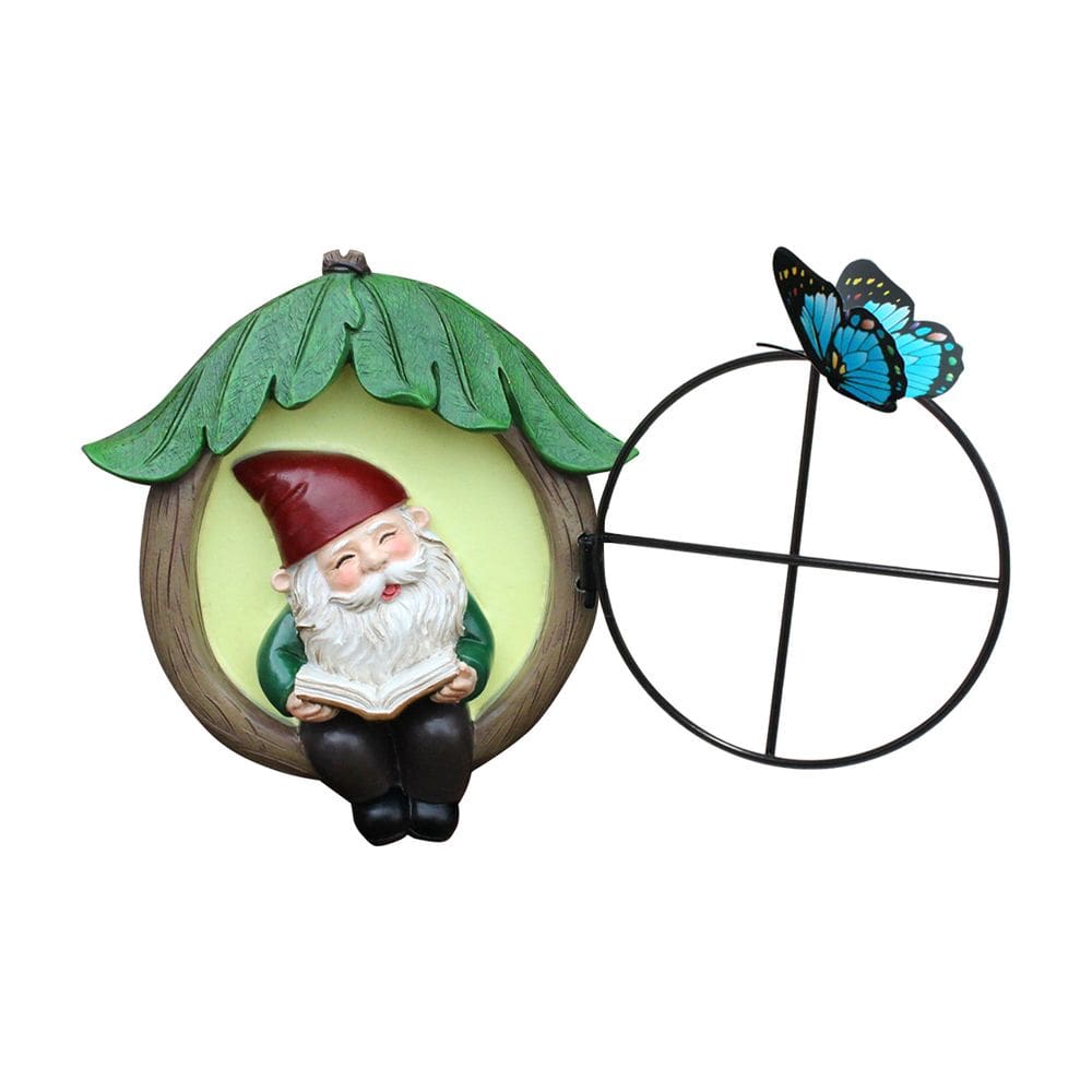 Decoração de jardim lendo escultura de gnomo com borboleta azul
