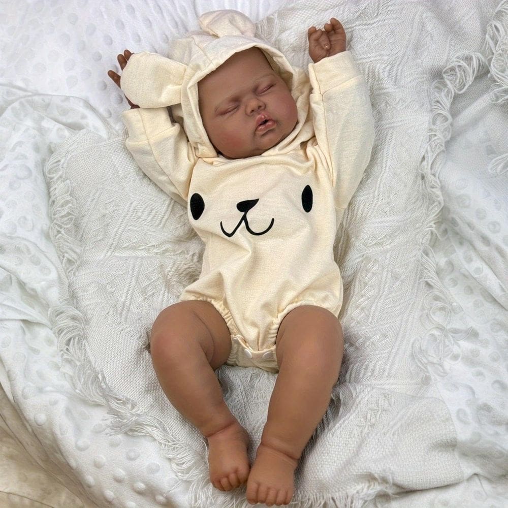 Muñeca Reborn Bebé GUESSBELLY Dormida Gordita 50cm Piel Marrón Oscura